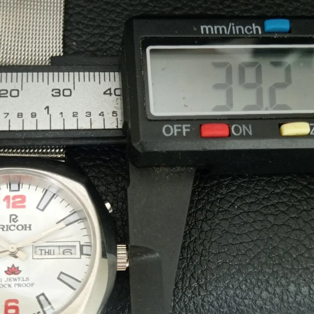 Vintage 1976 Ricoh Automatic Mens Silver Watch W/daydate & Red accents